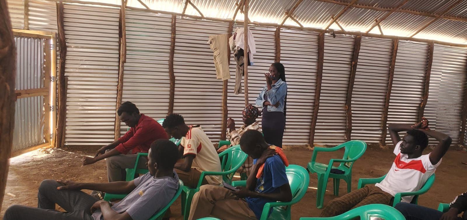 Placeholder photo: a mentor in conversation with a young person