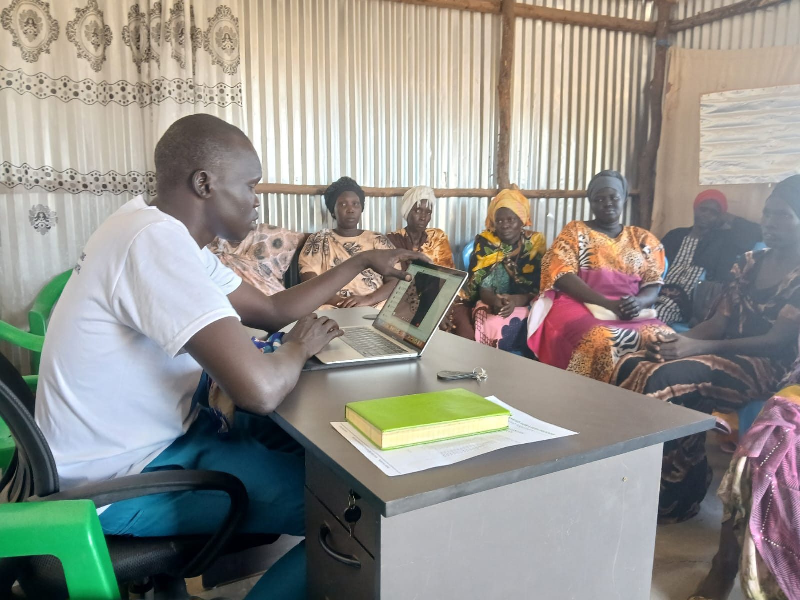Placeholder photo: participants at an ICT training session